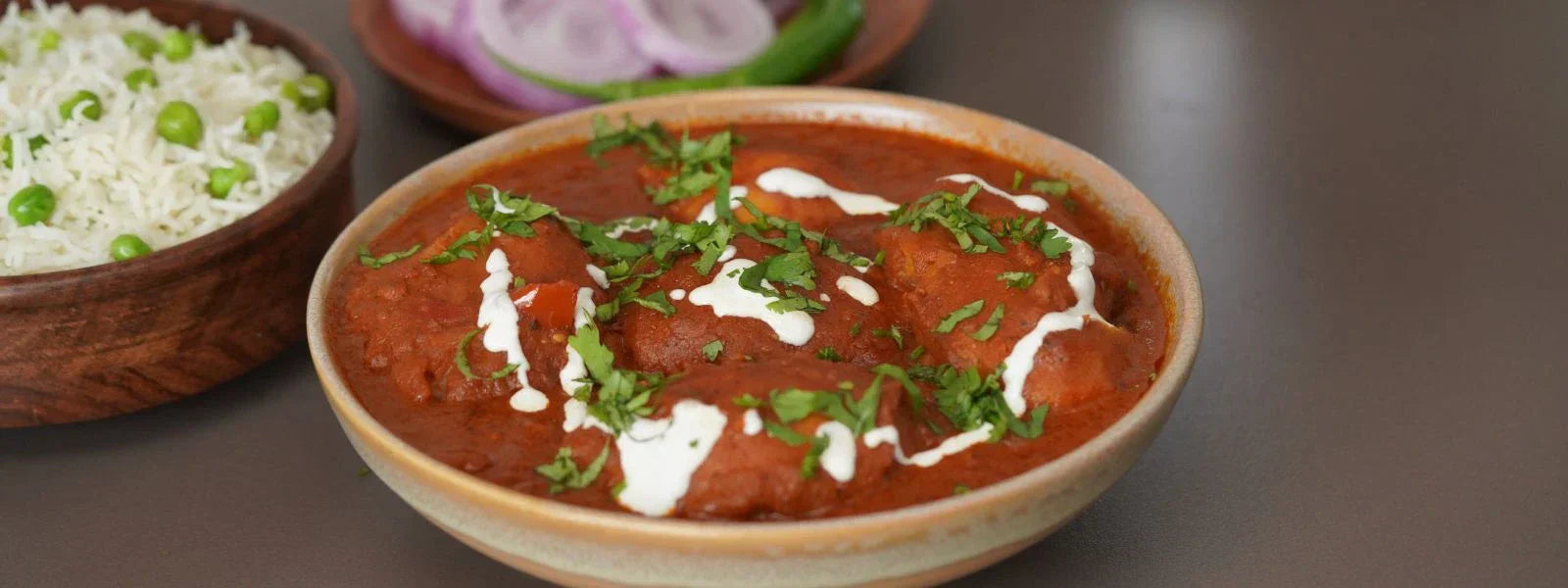 Tandoori Dum Aloo: A North Indian-style potato curry with bold spices and a rich, yogurt-based gravy