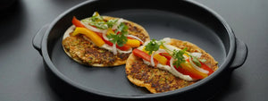 Lauki Paneer Smash Tacos: A healthy, fusion-style taco with a flavorful lauki-paneer stuffing, smashed and seared on a tawa