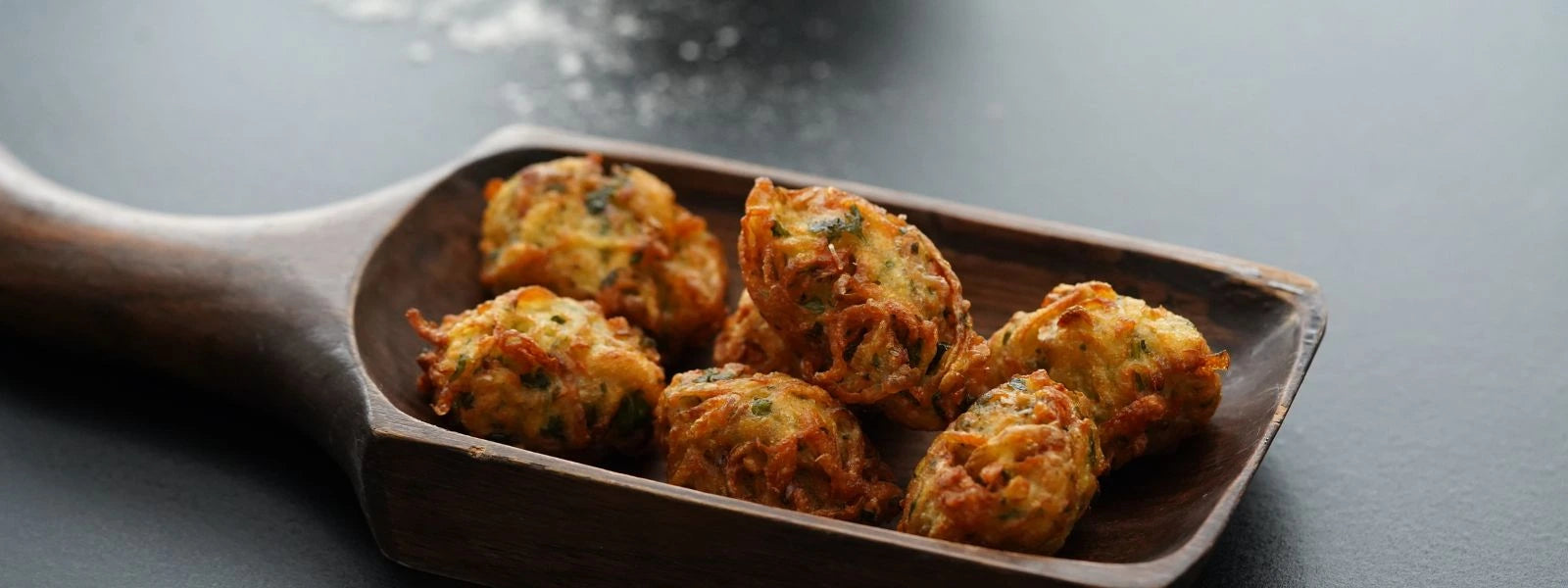 Crispy Aloo Pakoda: Crunchy, golden potato fritters that are packed with flavor