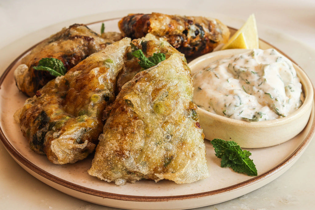 Cheesy Rice Paper Samosa: A crispy, cheesy fusion of classic samosa flavors with a modern twist.