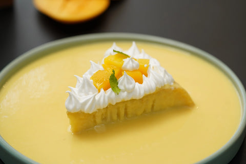 Mango Tres Leches:  Soft Vanilla Sponge Soaked in Mango Milk