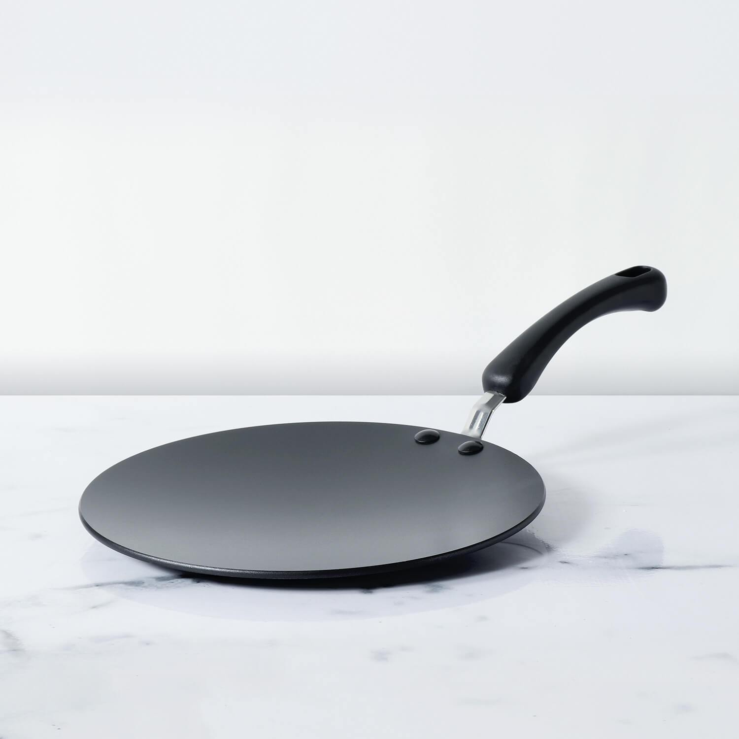 https://www.potsandpans.in/cdn/shop/products/Curved_Tawa_black.jpg?v=1569098117